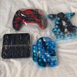 Source Unknown Multicolor Pop It Toy Set. Price for all four.